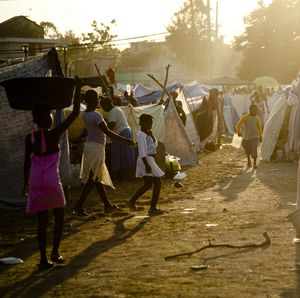 At the refugee camp in front of the airport.